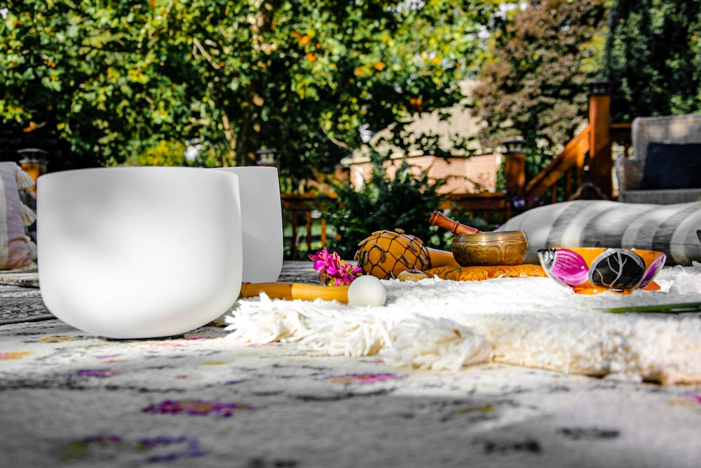 A white glass over the carpet and assorted decor